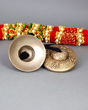 Seven Metal Om Tingsha On A Cord