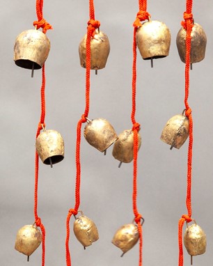 Four Tin Temple Shape Bells On A Cord